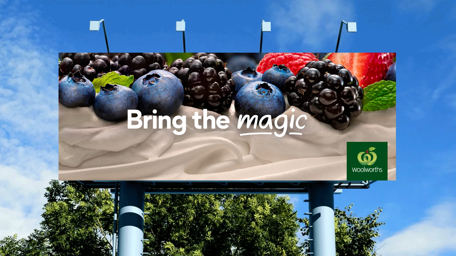 Bring the magic: berry pavlova on a Woolworths billboard
