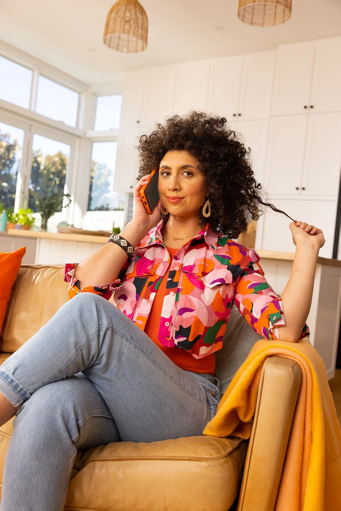 Everyday Mobile lifestyle photography of a woman relaxing with her phone