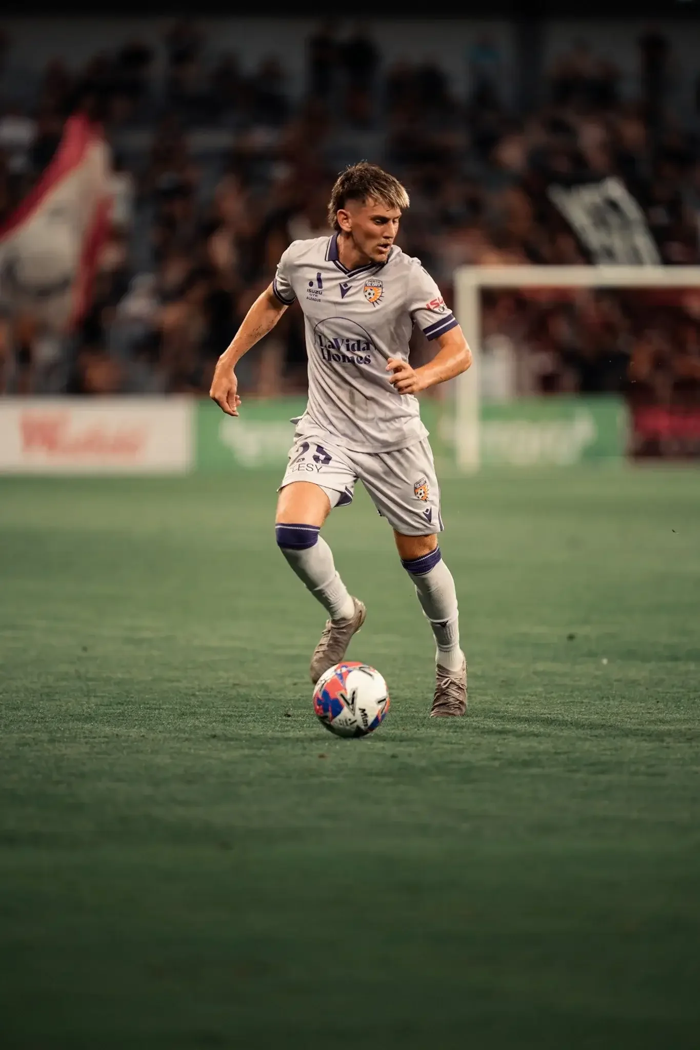 A player carries the ball forward